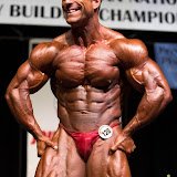 Greg Doucette fitness YouTube channel -- IFBB pro coach teaching progressive overload and anabolic cooking